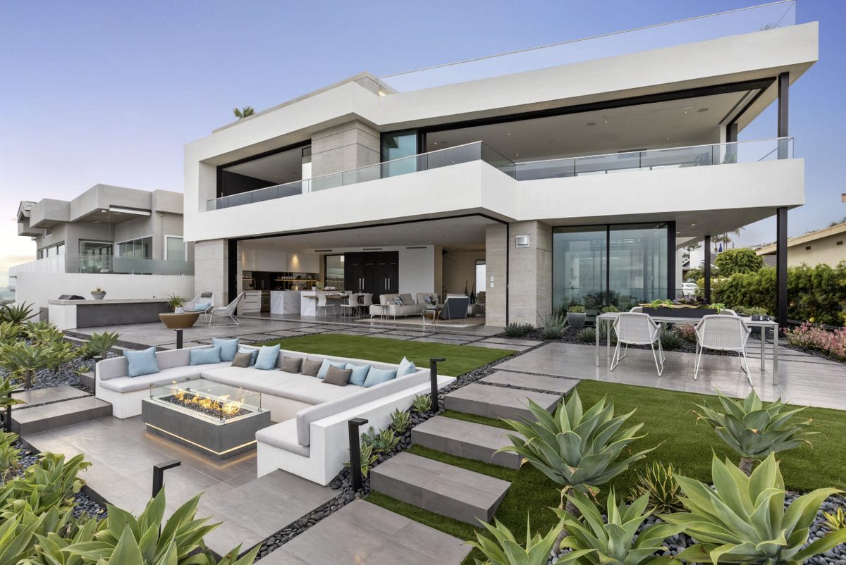 Modern outdoor living space with fire pit and turf San Diego CA by Panjia Outdoors